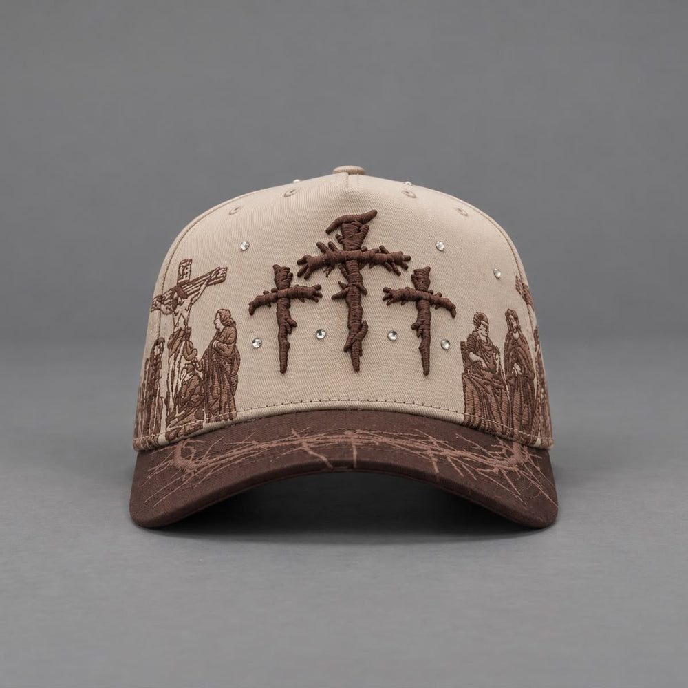 Front product view of ViaCrucis cream cap with raised crosses and brown visor