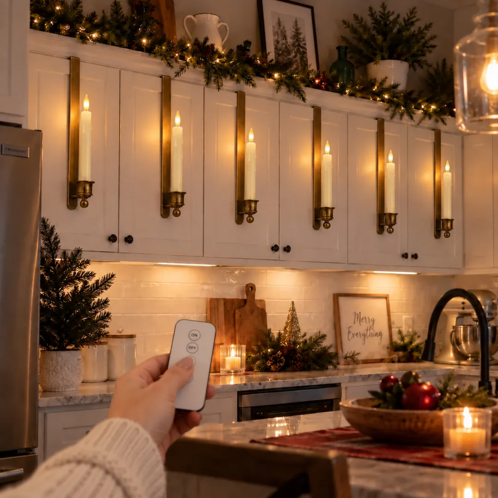 Remote controlling multiple glowing cabinet candles across a Christmas kitchen at night