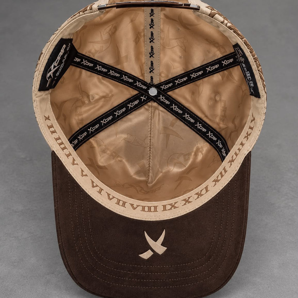 Inside view of ViaCrucis cap showing inner taping, seams and visor underside