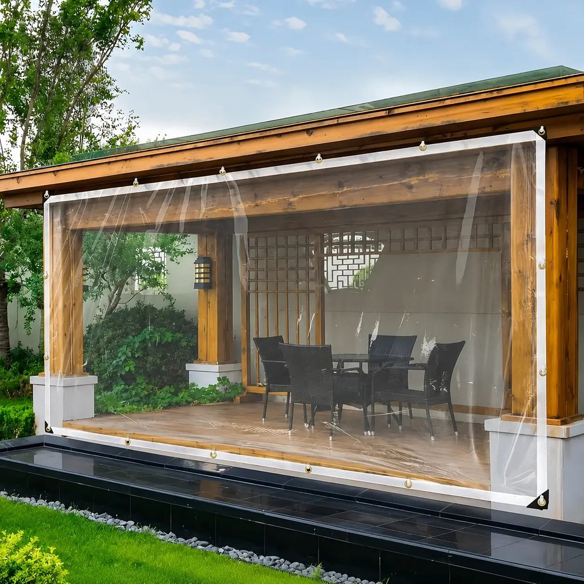 Transparent outdoor tarp covering patio area