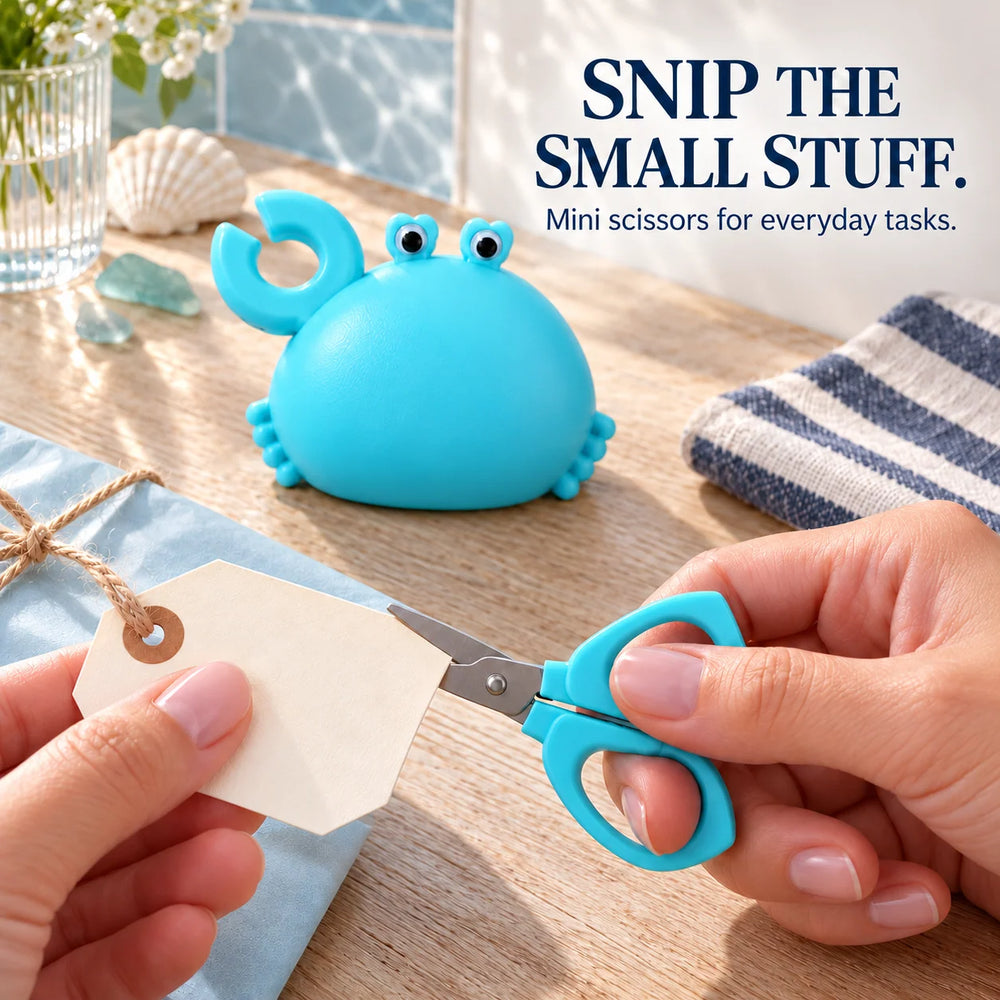 Using the removable Handy Crab mini scissors to trim a gift tag