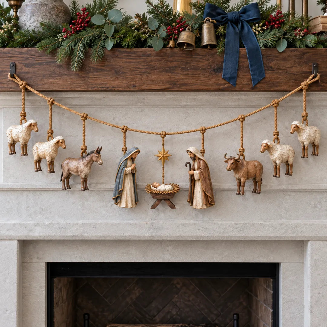Wooden Nativity garland hanging across a Christmas mantel with Mary Joseph and Baby Jesus