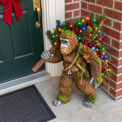 🔥 LAST DAY 50% OFF 🔥🦶 Woodland Sasquatch Christmas™ – Lighted Bigfoot Porch Decor with Evergreen, Berries & Colorful Holiday Lights 🎄✨