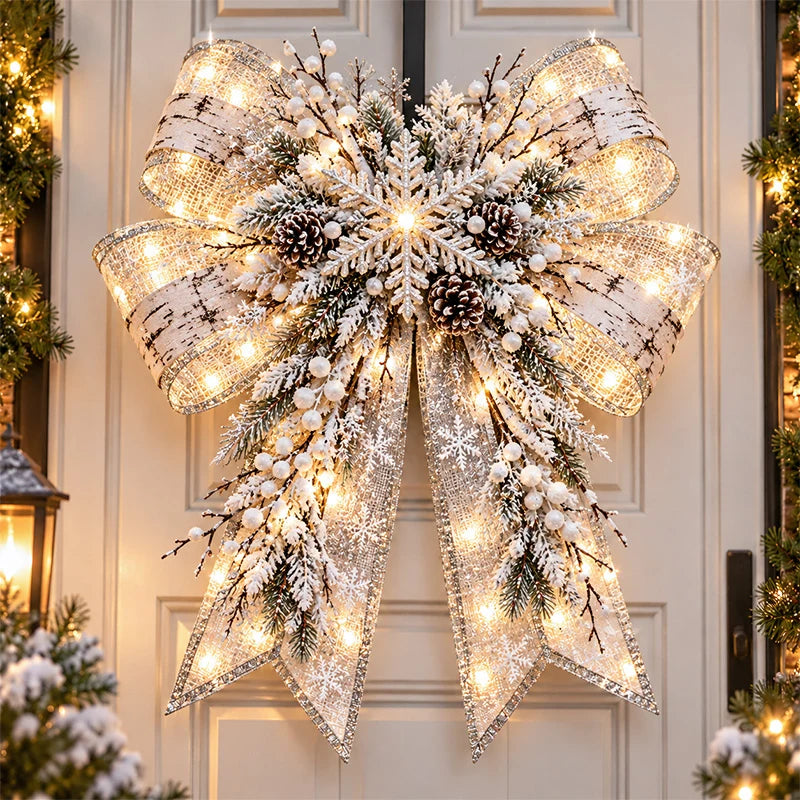 Frosted Birch Christmas bow with white winter ribbon, snowy greenery and snowflake centerpiece