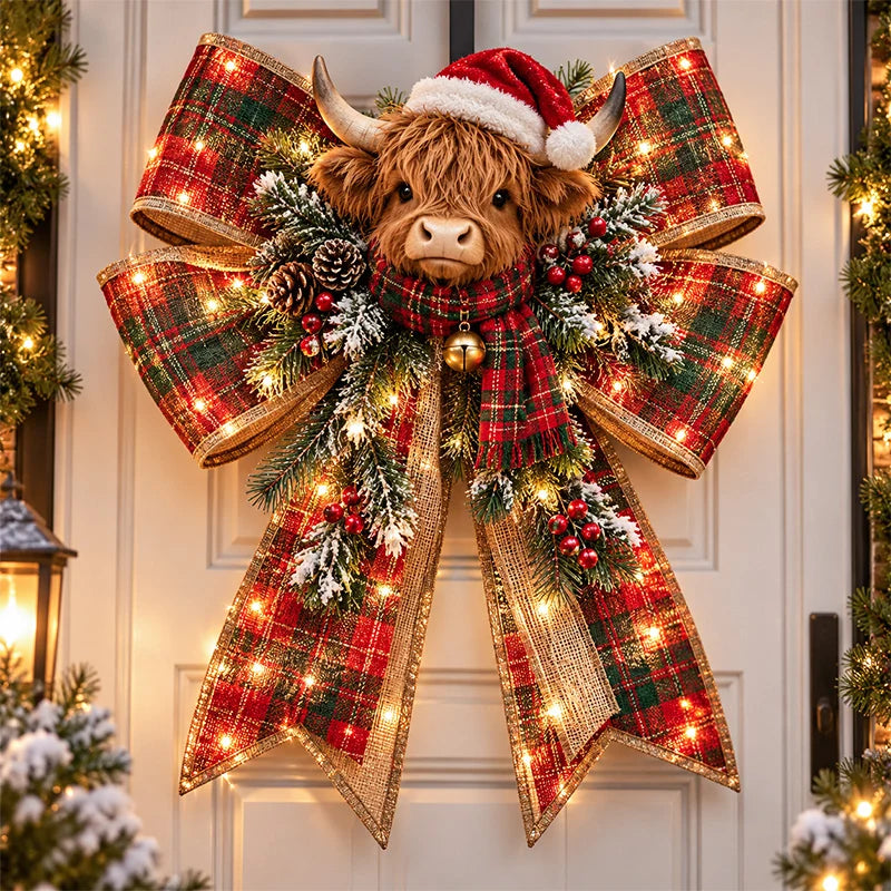 Highland Cow Christmas bow with rustic plaid ribbon and evergreen decorations