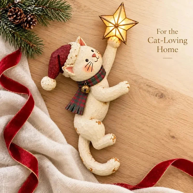 Vintage Christmas cat topper holding a glowing star