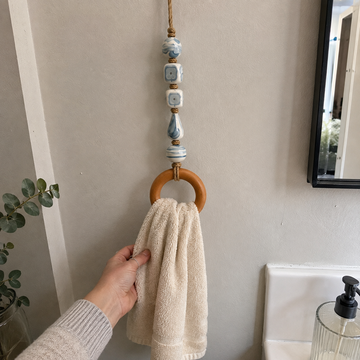 Decorative beaded towel hanger styling