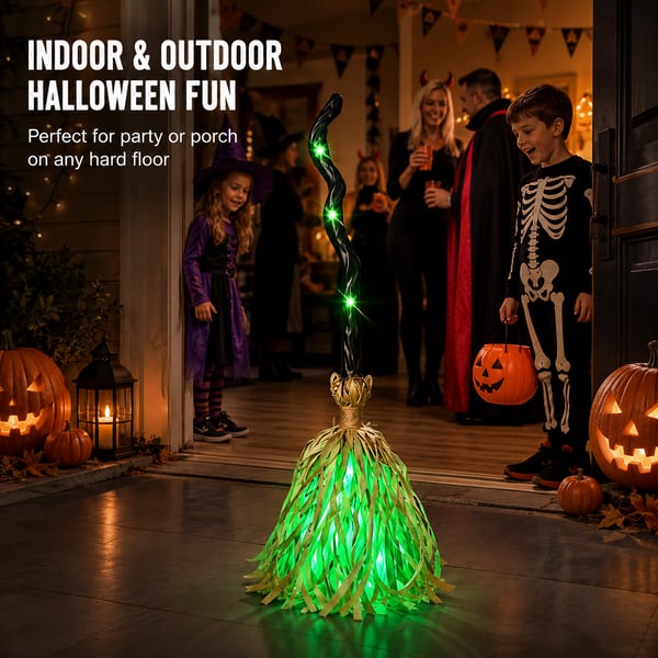 Animated green witch broom moving at Halloween party entrance