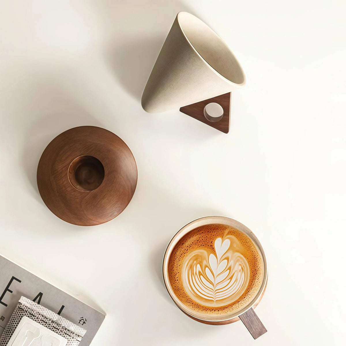 Ceramic coffee cup on wooden base