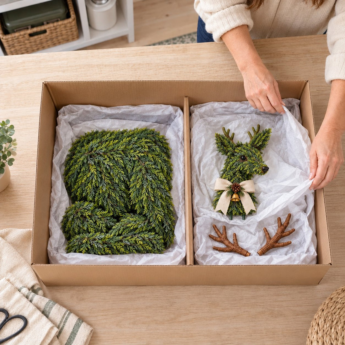 Original photo showing evergreen reindeer body, removable head section and antlers laid in a storage box
